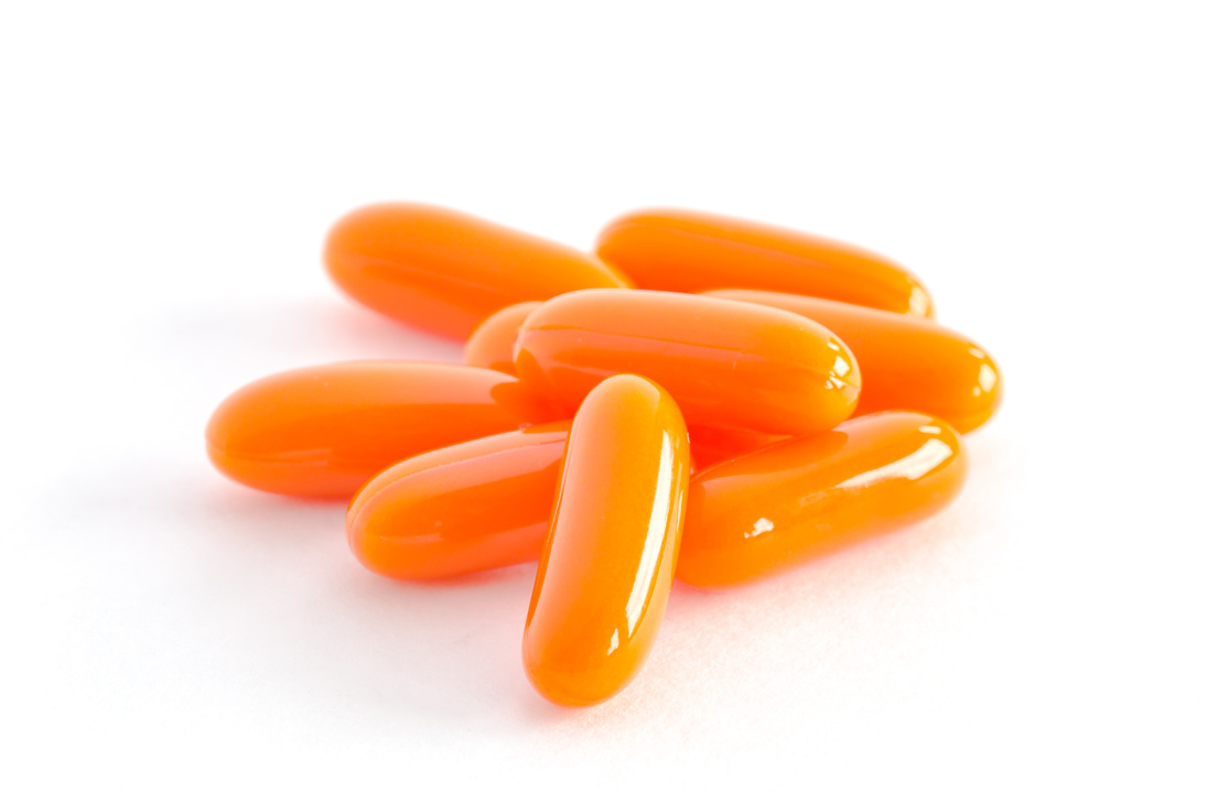 CoQ10 gel vitamin supplement capsules.